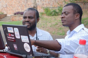 Emmanuel Togo and Ato Yawson compare readings.